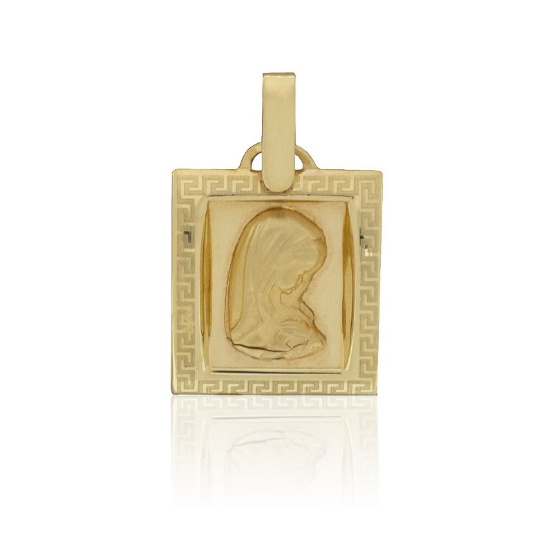 Medalla Virgen niña greca oro de 18 quilates.